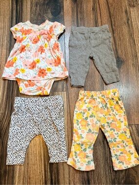 Baby girl 4 piece bundle of pants and romper size 0-3 mos